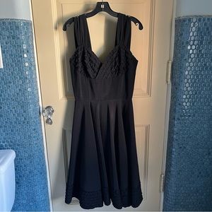 Candice Gwinn black fit and flare sweetheart black dress New Orleans